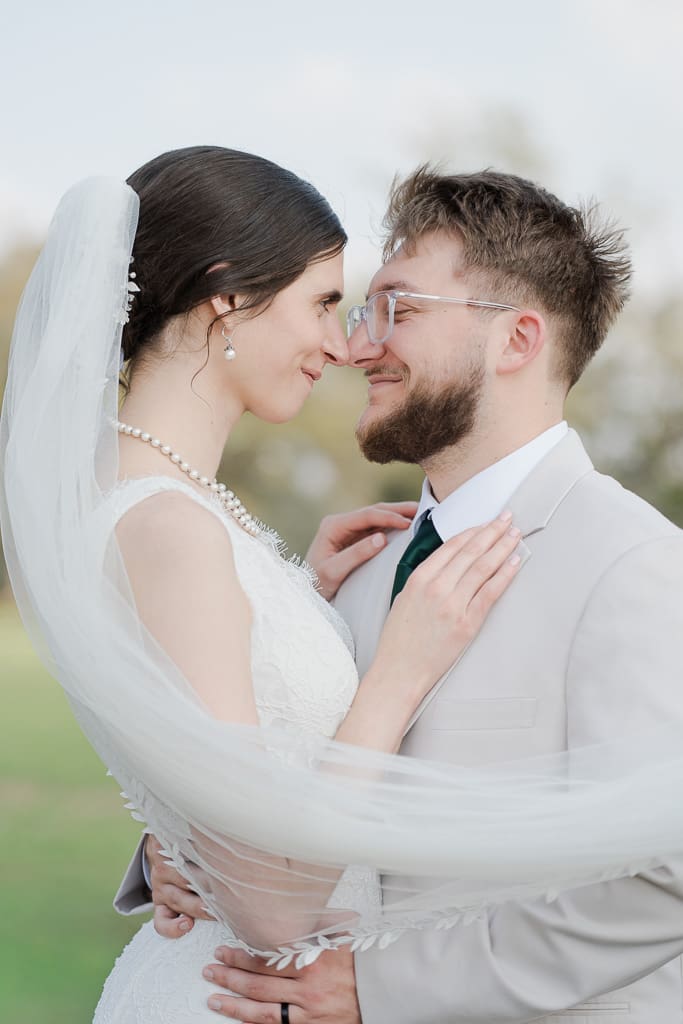 Bride and Groom having an intimate moment following wedding ceremony, South Louisiana Photographer