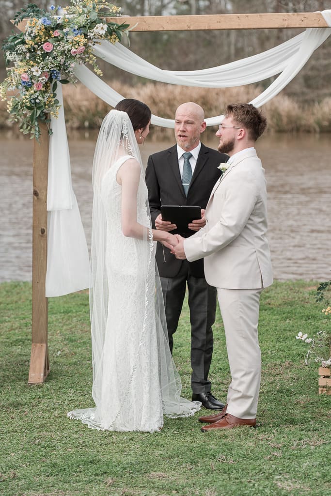 Bride and Groom at altar by Acadiana Wedding Photographer, Louisiana
