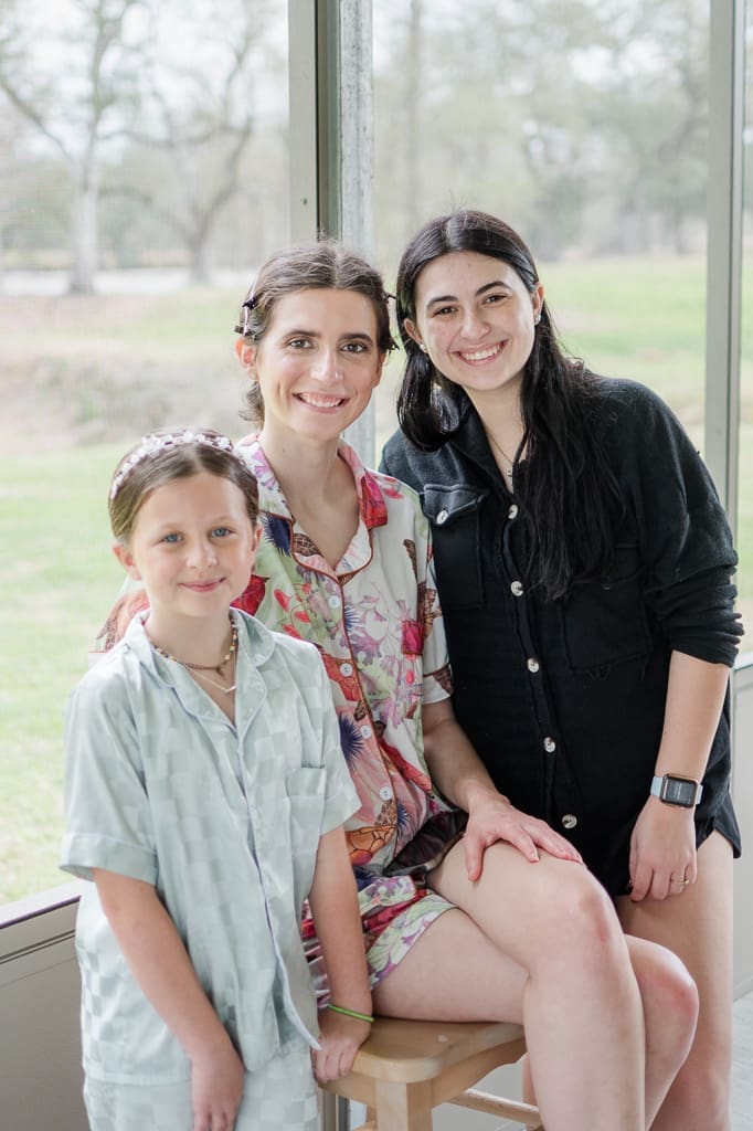 Bride with HMU artist and friend and flower girl, with South Louisiana Wedding Photographer