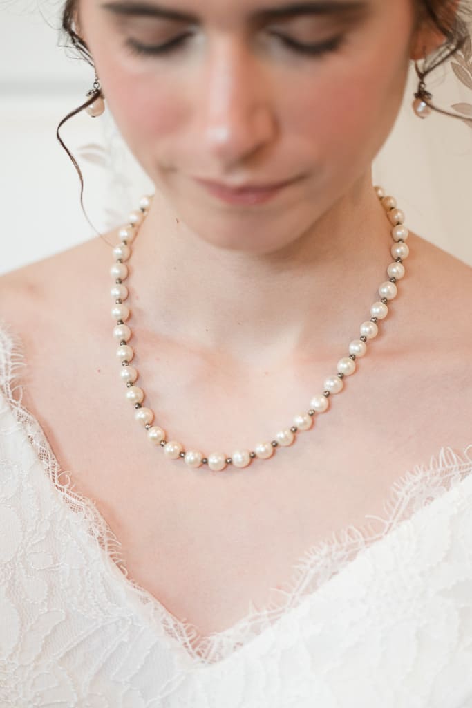 Bride's "something borrowed" pearls with South Louisiana Wedding Photographer