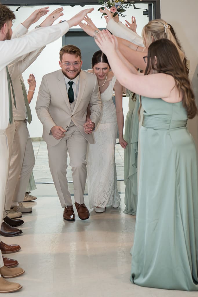 Bride and Groom reception entrance by South Louisiana Wedding Photographer