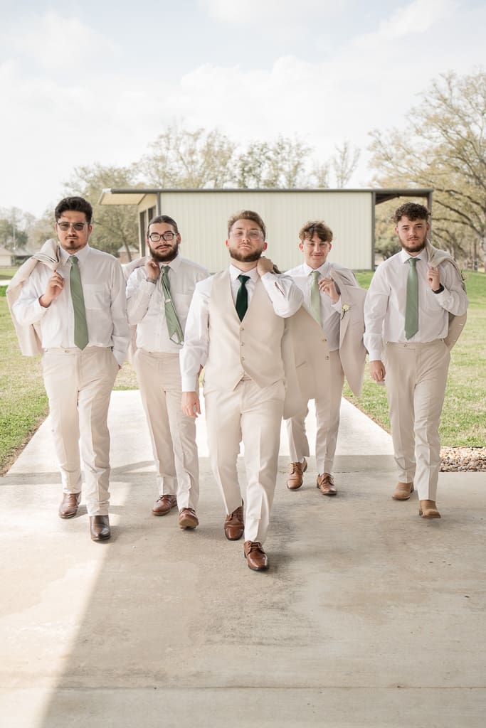 Groom with Groomsmen walking at South Louisiana Wedding
