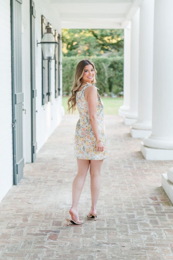 College graduate from LSU in Eunice, Louisiana walking outside of the Hilliard Art Museum in Lafayette, Louisiana