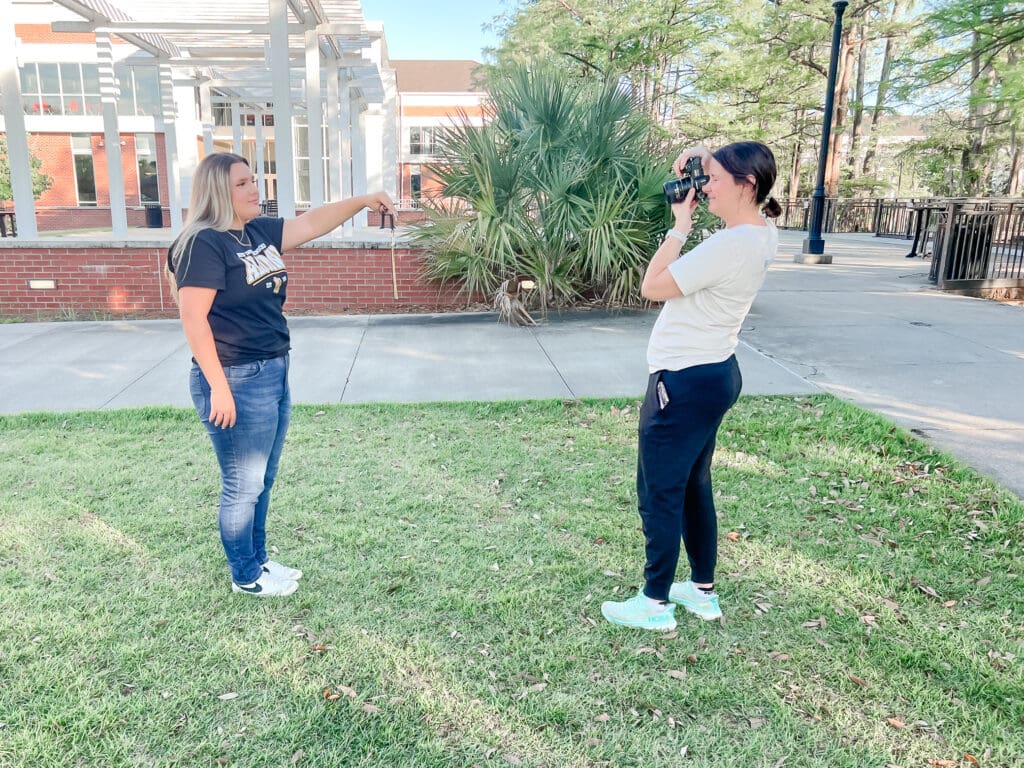 South Louisiana Photographer photographing tassle for a New Iberia Senior High graduate during Senior photo session at University of Louisiana at Lafayette